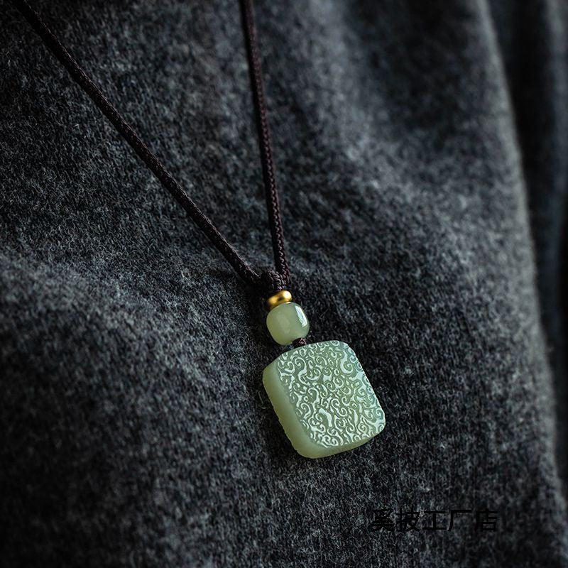Hetian Jade “Auspicious Cloud” Safety Pendant
