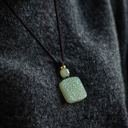 Hetian Jade “Auspicious Cloud” Safety Pendant