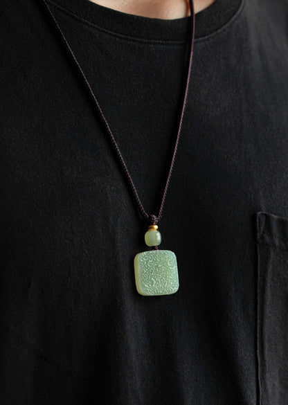 Hetian Jade “Auspicious Cloud” Safety Pendant